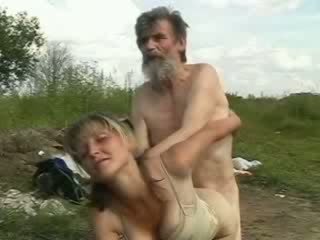 Sexy girl smiles while homeless old man fucking her wet vagina