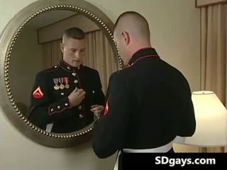 Soldier gay guy gets in full uniform