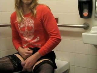 Sissy slut strokes in a public bathroom